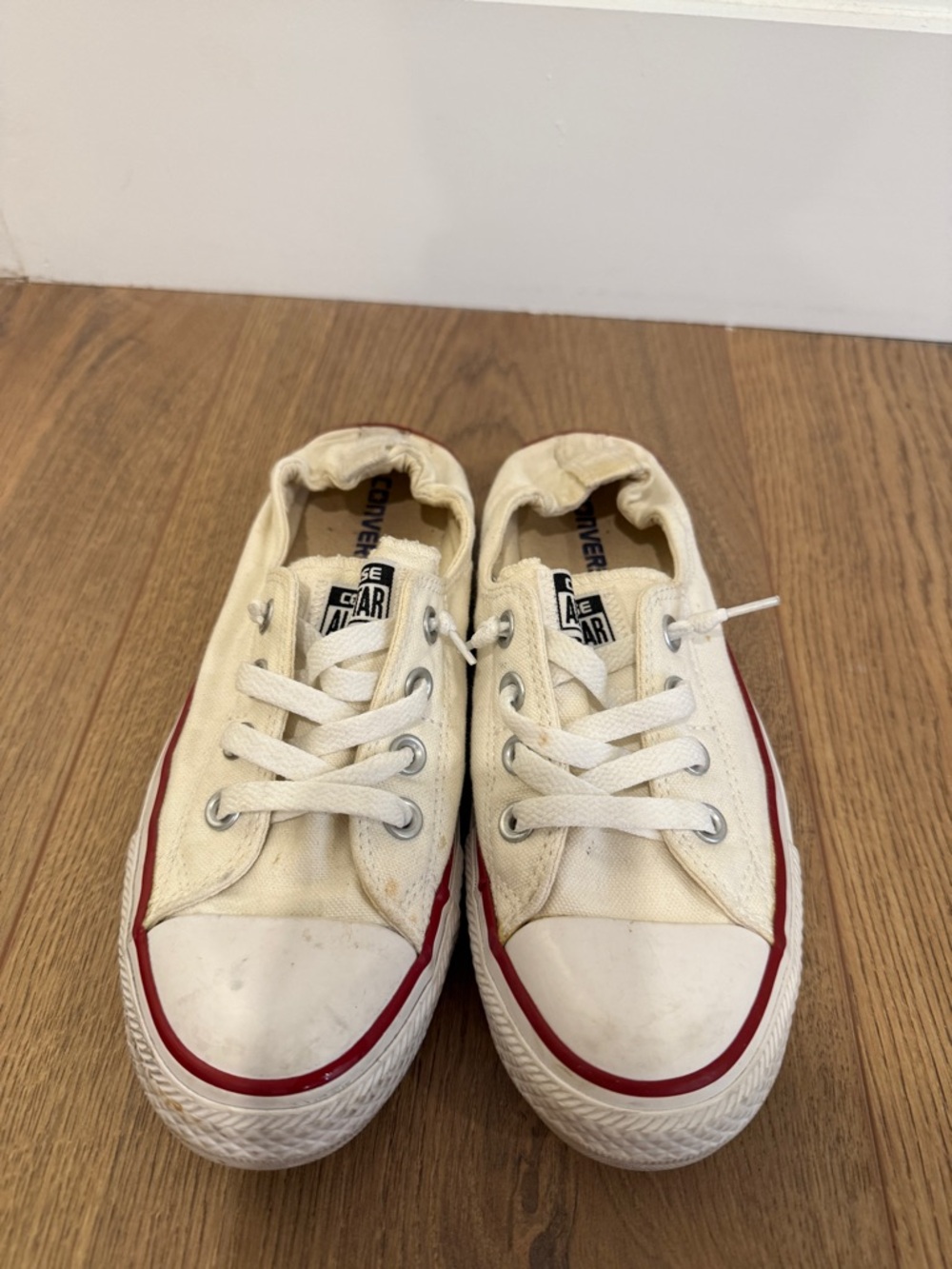 Converse Low Top Canvas Sneakers in Cream with Red Trim